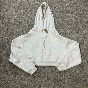 Pink Victoria’s Secret cropped hoodie